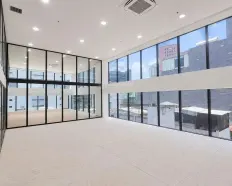 Văn phòng duplex Atlas Building tặng thêm tầng lửng + ban công ~57m²