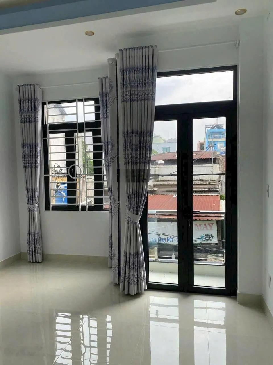 Nhà mới 4 x 14m, 2 lầu ST 4PN 4WC 4ml HXH Quang Trung