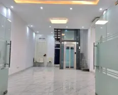 Nhà liền kề Vũ Phạm Hàm DT 85m2 x 6T giá 30tr/tháng sàn, thang máy, mới xây, vị trí nổi bật khu