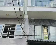 Cho thuê nhà 1 trệt 3 lầu sân thượng 5PN hẻm xe hơi đường Bùi Văn Ba