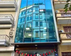 Cho thuê cả tòa 7 tầng Ngõ 34 Vũ Phạm Hàm DT: 90m2 x 7T. MT: 6m. Có thang máy