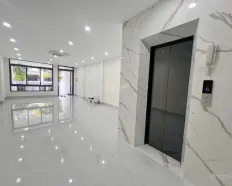 Cho thuê tầng trệt 5*23m hoàn thiện trống suốt,máy lạnh âm trần,thang máy lối đi riêng KĐT Vạn Phúc