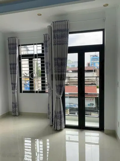 Nhà mới 4 x 14m, 2 lầu ST 4PN 4WC 4ml HXH Quang Trung